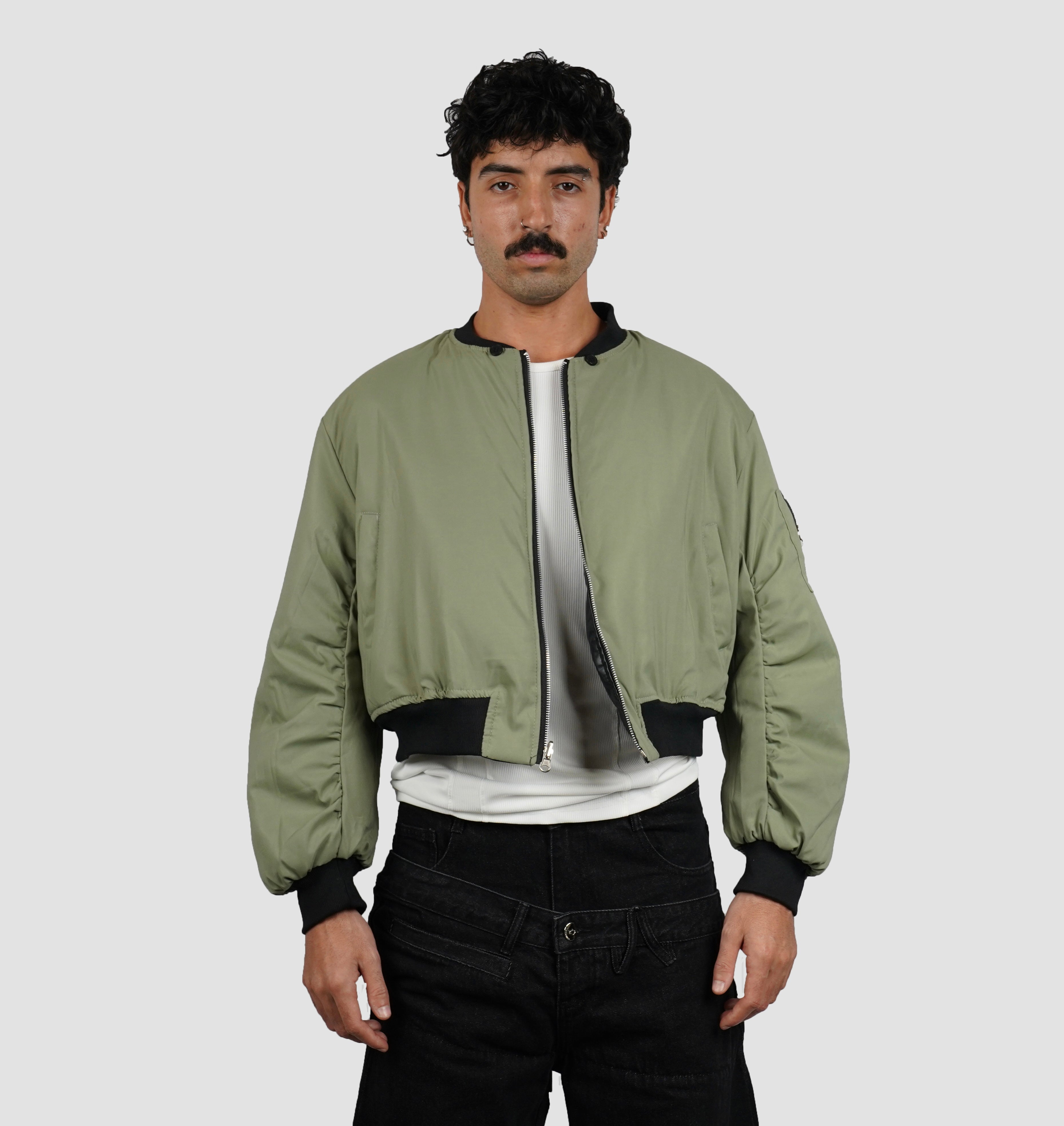 Reversible bomber with detachable hood