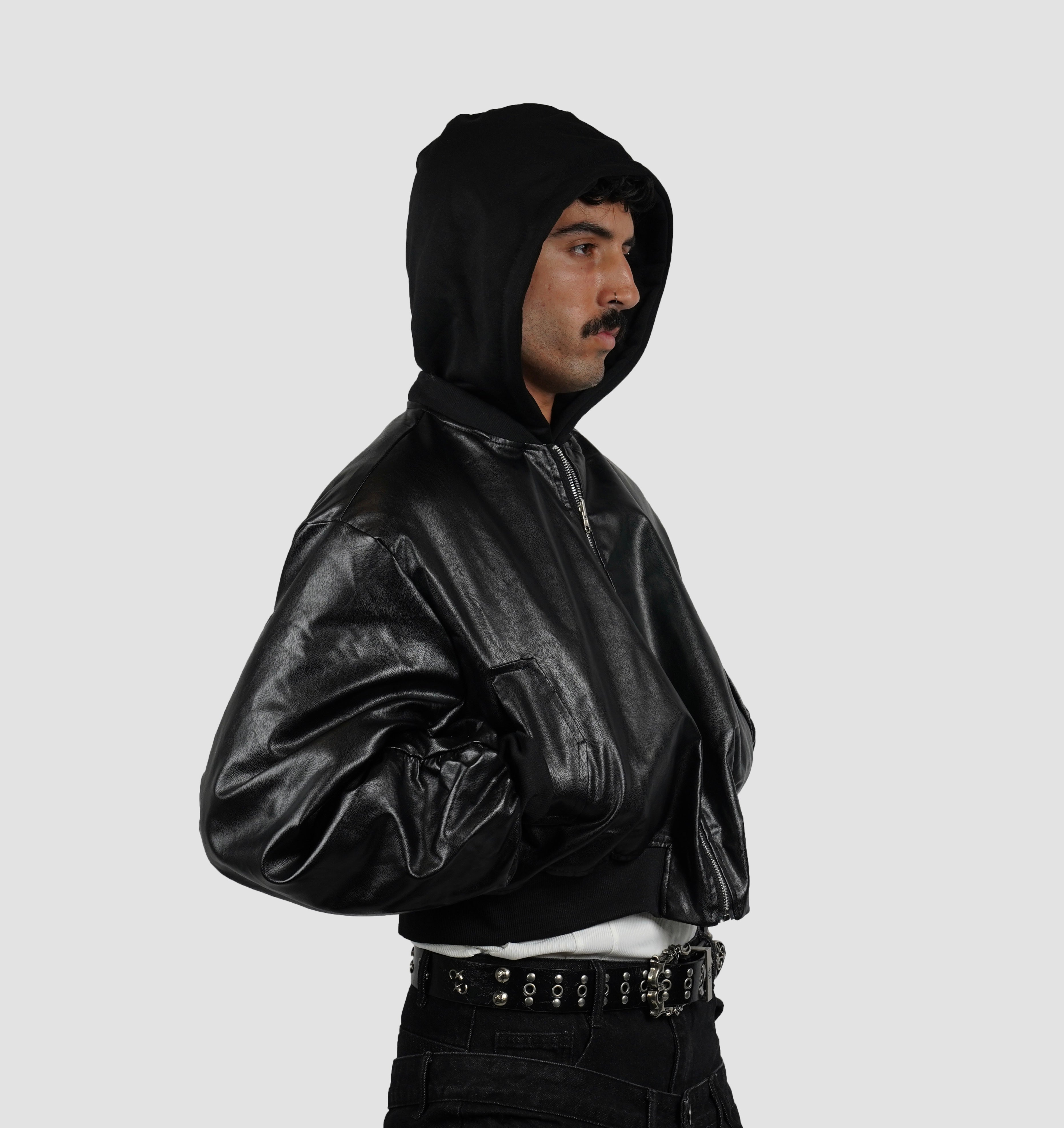 Reversible bomber with detachable hood