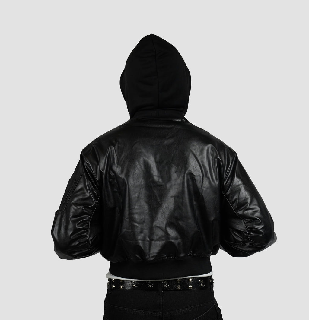 Reversible bomber with detachable hood