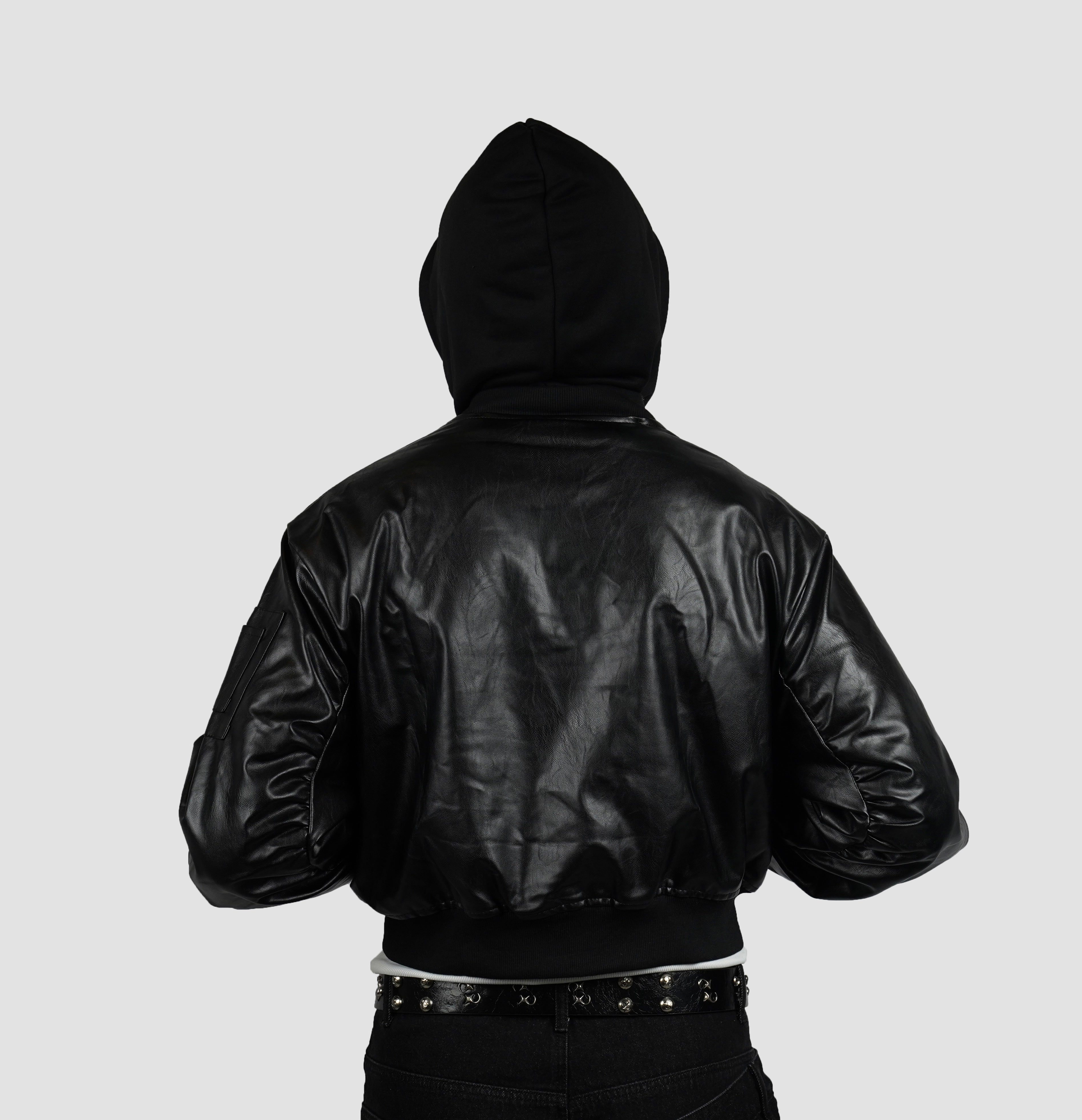 Reversible bomber with detachable hood